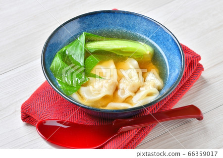 Wonton soup with green herring roe. Cloud soup. 66359017