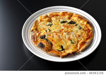Freshly baked crispy dough Margherita (black background) 66361156