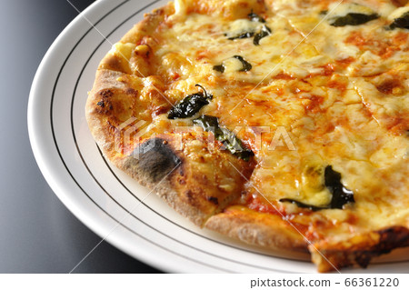 Freshly baked crispy dough Margherita (black background) 66361220