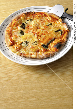 Freshly baked crispy dough Margherita and pizza cutter Freshly baked crispy dough Margherita and pizza cutter 66361414