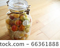 Homemade plum syrup in a storage container 66361888