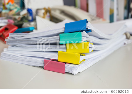 file folder and Stack of business report paper file on the table in a work office, concept document in work office file folder and Stack of business report paper file on the table in a work office, concept document in work office 66362015