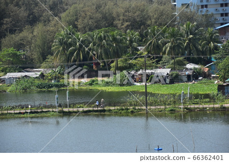 Cox's Bazar in Bangladesh A tourist hotel alongside the beach and a retro residence where locals live Cox's Bazar in Bangladesh A tourist hotel alongside the beach and a retro residence where locals live 66362401