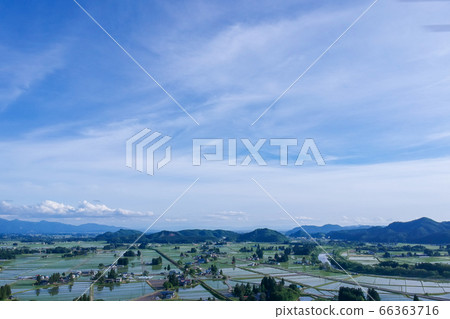Aerial view of rural landscape after rice planting, June Akita Prefecture Aerial view of rural landscape after rice planting, June Akita Prefecture 66363716