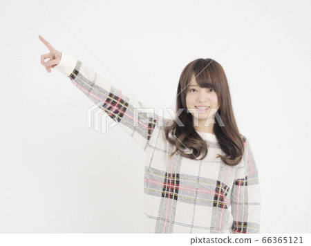 Woman pointing finger with smile Woman pointing finger with smile 66365121