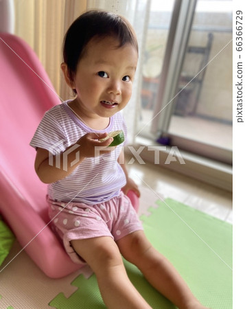 Child eating fruit Child eating fruit 66366729