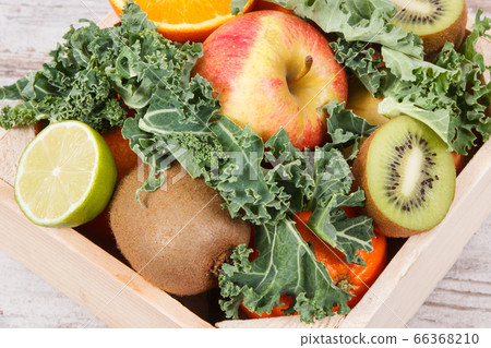 Fresh ripe fruits with vegetables. Healthy dessert Fresh ripe fruits with vegetables. Healthy dessert 66368210