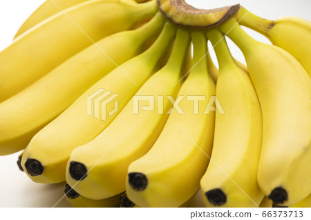 Fresh bunch of bananas white background 66373713