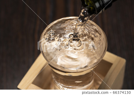 A spill of sake (mokkiri) A spill of sake (mokkiri) 66374130