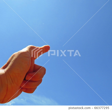 Blue sky and left hand 66377295