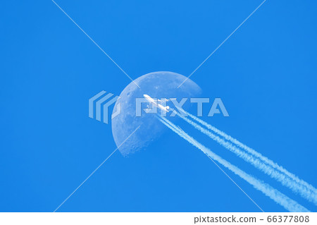 Passenger plane passes near the sun 66377808