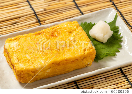 Served with fried eggs and grated radish. Summer image with background blinds. Served with fried eggs and grated radish. Summer image with background blinds. 66380306