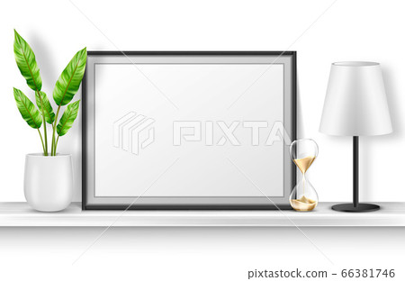 Empty photo frame stand on white shelf with plant Empty photo frame stand on white shelf with plant 66381746