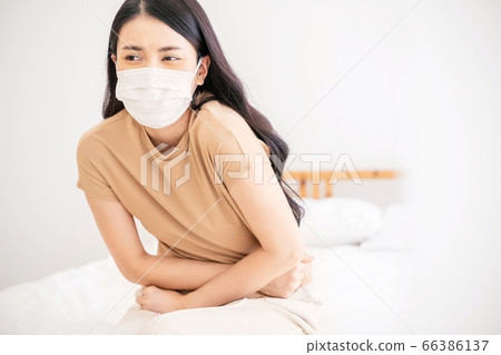Young woman ill sick spoiled bed bedroom person material Young woman ill sick spoiled bed bedroom person material 66386137