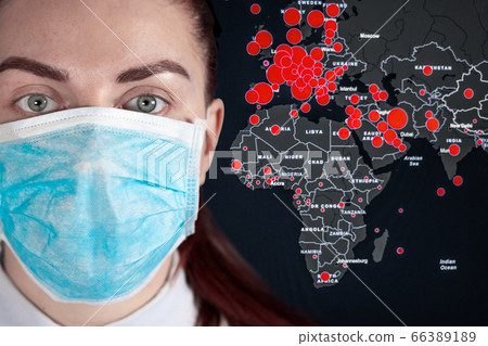 Coronavirus 2019-nCoV , woman with medical face is standing on the street and looking at the camera. Air pollution Coronavirus 2019-nCoV , woman with medical face is standing on the street and looking at the camera. Air pollution 66389189