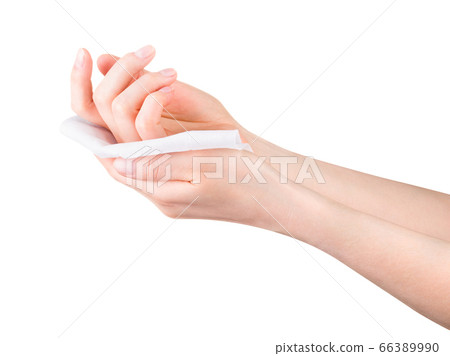 Woman hand use antibacterial wet wipes or tissue isolated on a white background 66389990