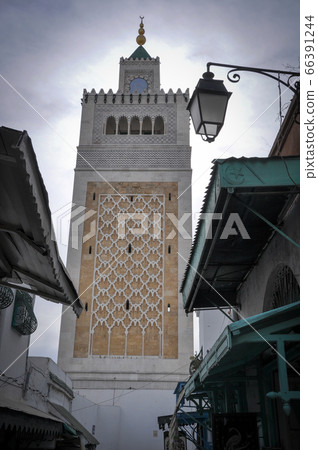 Tunis, TUNISIA - February 06, 2009: Minaret of the Al-Zaytuna Mosque in the Medina  66391244
