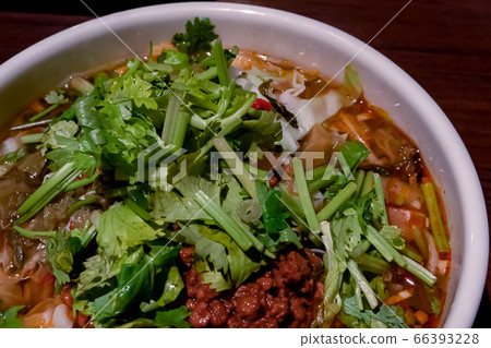 Mahiri sword cut noodles with pakchi Donburi partly expanded Mahiri sword cut noodles with pakchi Donburi partly expanded 66393228