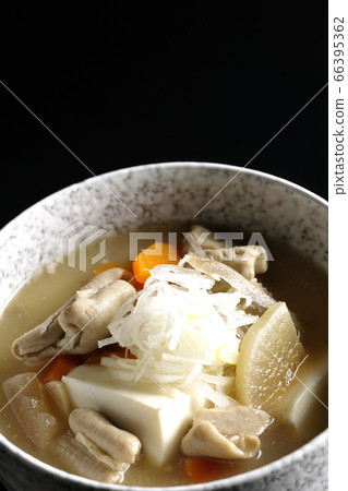 Stewed miso miso with black radish, carrot, burdock root, tofu (black background) 66395362