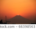 Diamond Fuji where the setting sun rises just above Mt. Fuji. View from Miura City 66398563