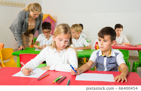 Boy and girl pupils of elementary school Boy and girl pupils of elementary school 66400454