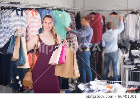 wife shopping bags with purchase in bags at apparel store wife shopping bags with purchase in bags at apparel store 66401301
