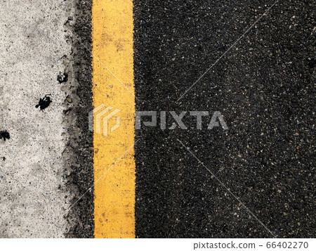 Yellow line on asphalt road Yellow line on asphalt road 66402270
