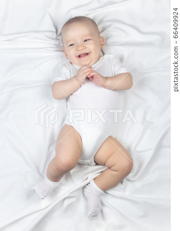 Photo of laughing seven month old baby boy 66409924