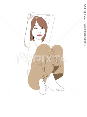 A woman sitting with her hands on her head A woman sitting with her hands on her head 66410459
