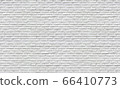 the pattern or texture of the white wall of bricks use for background or backdrop 66410773