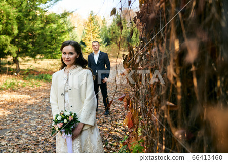 Young male and woman just married. Concept of Young male and woman just married. Concept of 66413460