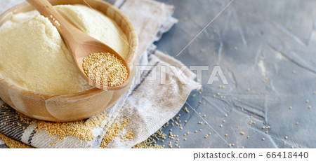 Bowl of raw Amaranth flour with a spoon of Bowl of raw Amaranth flour with a spoon of 66418440