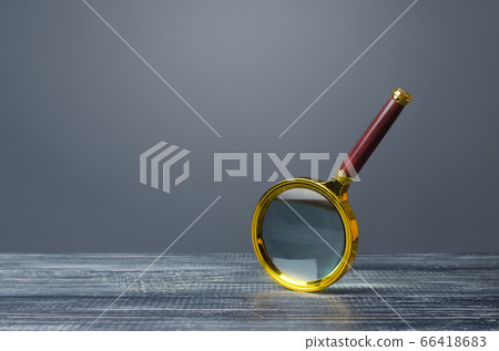 People look at a huge magnifying glass. Search and analysis, analytics and study. Pay attention to details and problems. Find something. Journalistic investigations and research. Emphasize attention People look at a huge magnifying glass. Search and analysis, analytics and study. Pay attention to details and problems. Find something. Journalistic investigations and research. Emphasize attention 66418683