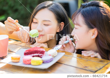 Women, eating, nature 66421734