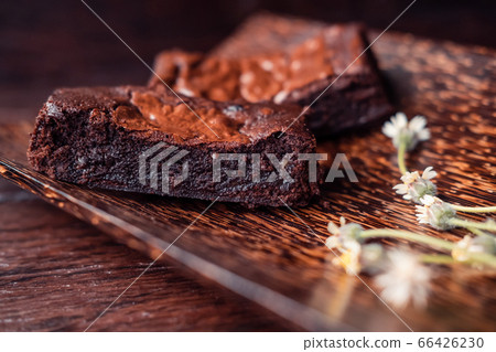 Delicious homemade chocolate brownies on dark background. Chocolate dessert aesthetics 66426230