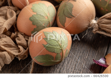 Preparation of Easter eggs for dying with onion peels 66426500