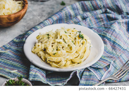 Homemade Fettuccine with Alfredo Sauce Homemade Fettuccine with Alfredo Sauce 66427431