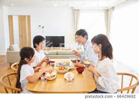 Family eating at home Family of 4 Family eating at home Family of 4 66429682