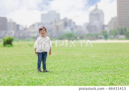 Girls playing in the park 66431413