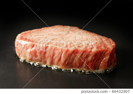 Grilled fillet steak on an iron plate (Japanese black beef from Hokkaido) 66432907