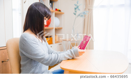 Woman with passport copy space 16:9 66435695