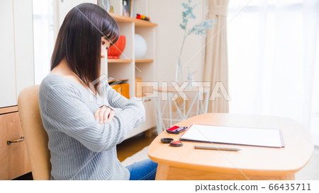 Woman confirming documents Various documents Arms group 16:9 66435711