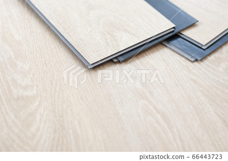 Home. Home renovate and wood materials. Materials design for home furniture. Copyspace for text background. sample of wood plank surface. Plywood, Laminate, veneer. vinyl wood floor Installation for Home. Home renovate and wood materials. Materials design for home furniture. Copyspace for text background. sample of wood plank surface. Plywood, Laminate, veneer. vinyl wood floor Installation for 66443723