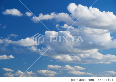 Bright beautiful blue sky with soft clouds, bright 66444193