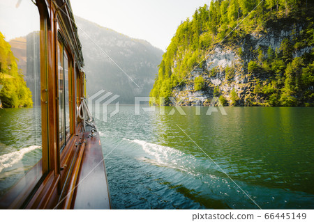 Traditional passenger boat on Koenigssee lake in Bavaria, Germany Traditional passenger boat on Koenigssee lake in Bavaria, Germany 66445149