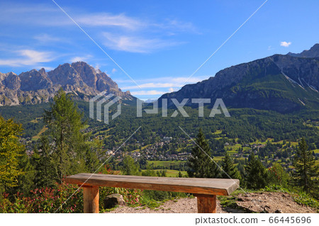 wooden bench with amazing view on Dolomiti. wooden bench with amazing view on Dolomiti. 66445696