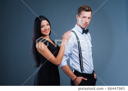 very funny emotional love in a suit. Studio shot 66447965