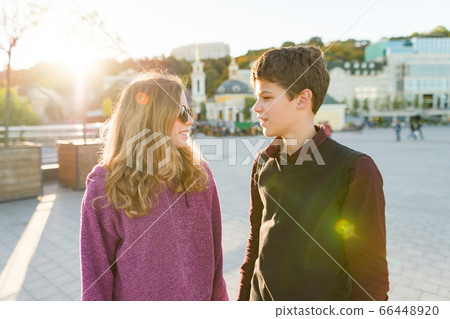 Outdoor portrait of couple young boy and girl Outdoor portrait of couple young boy and girl 66448920
