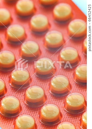 Heap of medicine pills. Background from colorful pills and capsules Heap of medicine pills. Background from colorful pills and capsules 66452425
