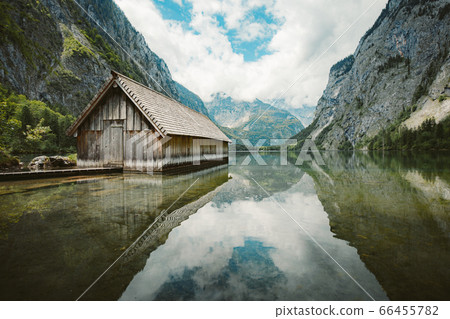 Old boat house at Lake Obersee in summer, Bavaria, Germany Old boat house at Lake Obersee in summer, Bavaria, Germany 66455782